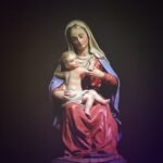 Mother Mary and Christ Figurine on Black Background