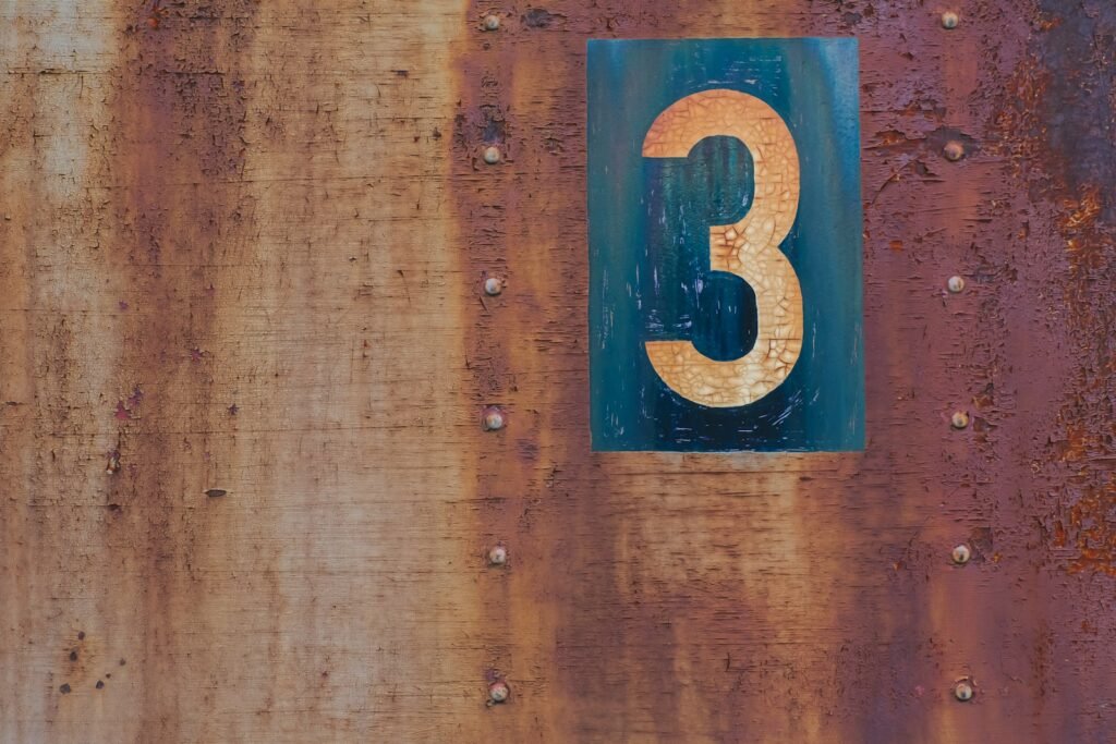 blue and orange number 3 - what does the number 3 mean in the bible?