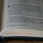 a close up of an open book on a table