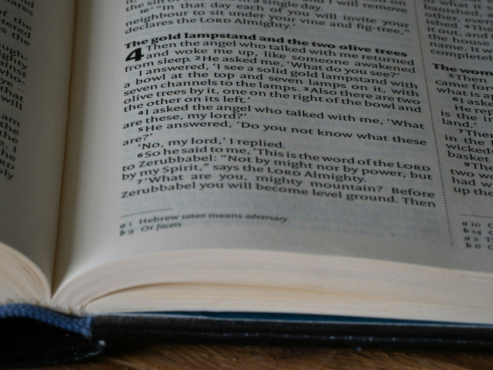 a close up of an open book on a table