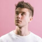 is alec benjamin a christian